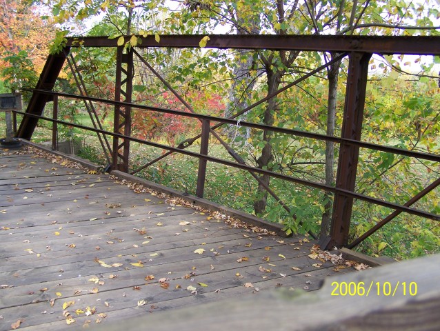 Looking northwest at the bridge's iron structure.