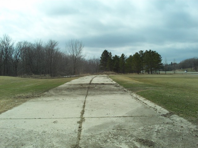 Old Concrete, Boyer Lake. A short section of the old concrete pavement survives just west of Boyer Lake on the south side of the modern highway.