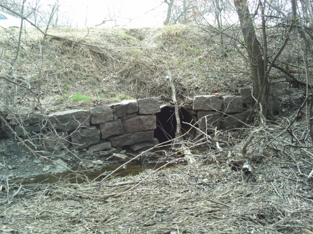 A culvert with granite facing along the old road just east of Hawley.