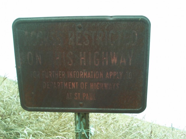 A rusting highway sign along old U.S. 10. 