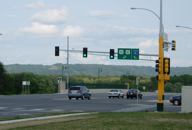 Route signage in La Crescent, showing Highway 16 continuing east towards the Wisconsin State Line